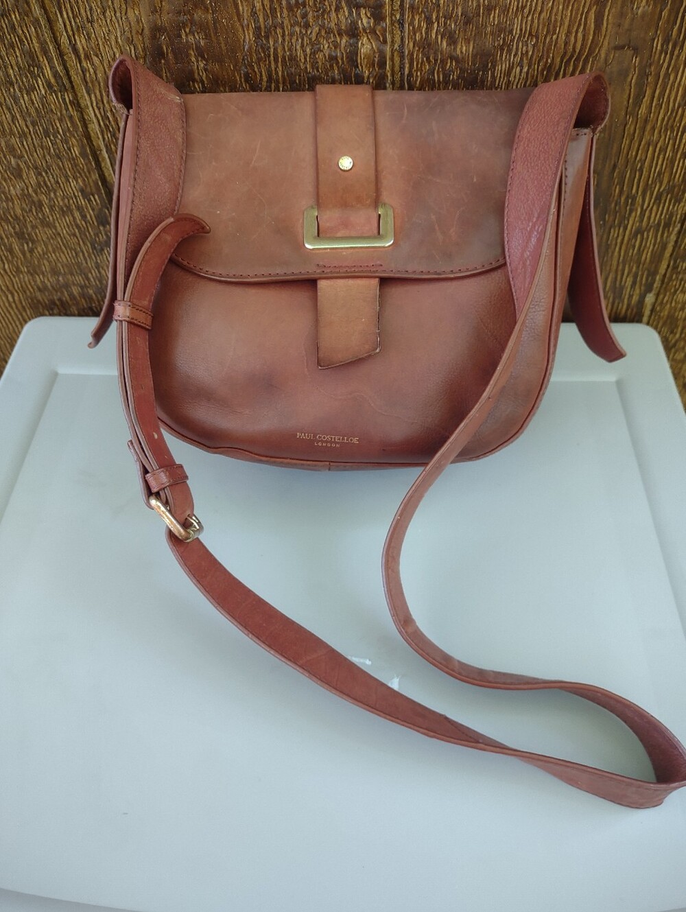Paul Costelloe London tan leather crossbody bag.